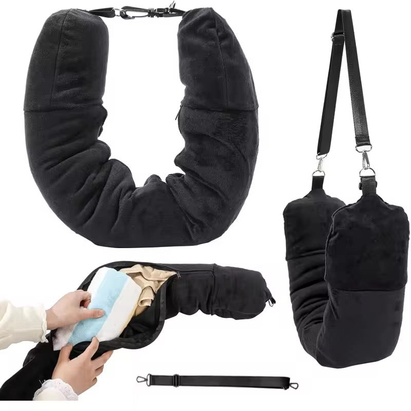 Black travel neck pillow with strap and pouch on a white background